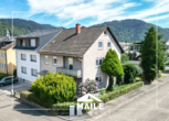 Familienfreundliches 1-3 Familienhaus in ruhiger Lage mit Garten und 3 Garagen - Hausansicht