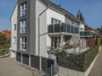 Barrierefreie, hochwertige und sonnige 4,5 Zimmerwohnung mit Terrasse und Garten - Außenansicht